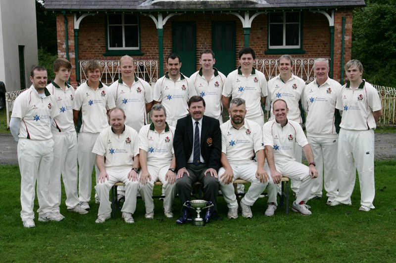 Donaghcloney 1st XI - Winners of Ulster Bank Section 2 - with NCU Chairman Roger Bell